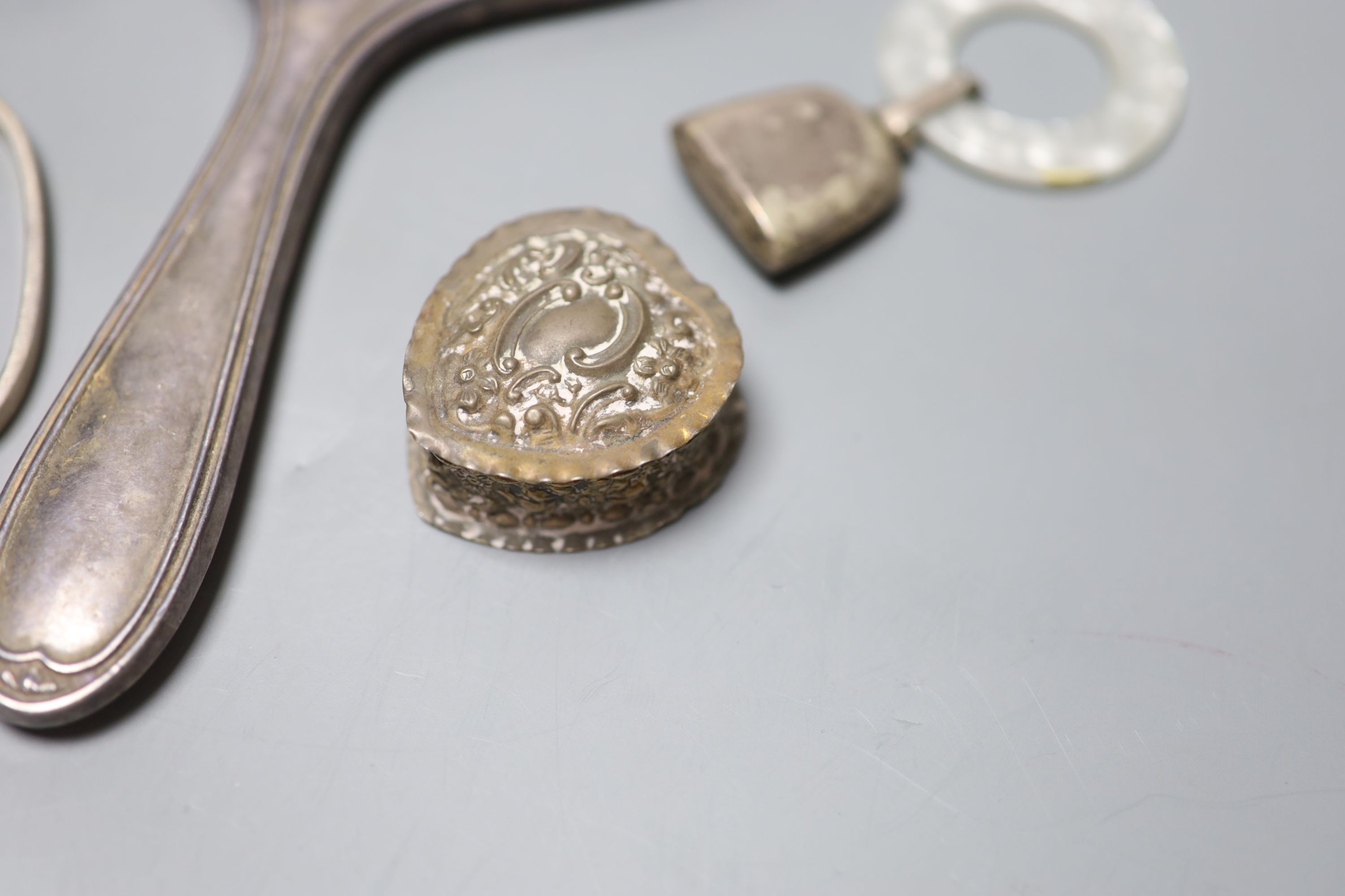 Assorted minor silver etc. including a hand mirror, pill boxed, teething rattle and a 925 bangle.